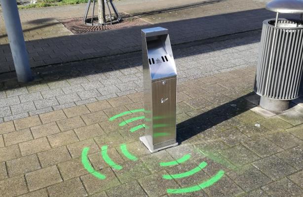 cigarette butt receptacles at bus station